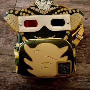 Loungefly Green and Yellow Character Backpack